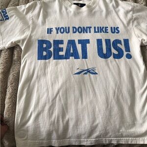 HELLSTAR White T‑Shirt with Blue 'Beat Us!'